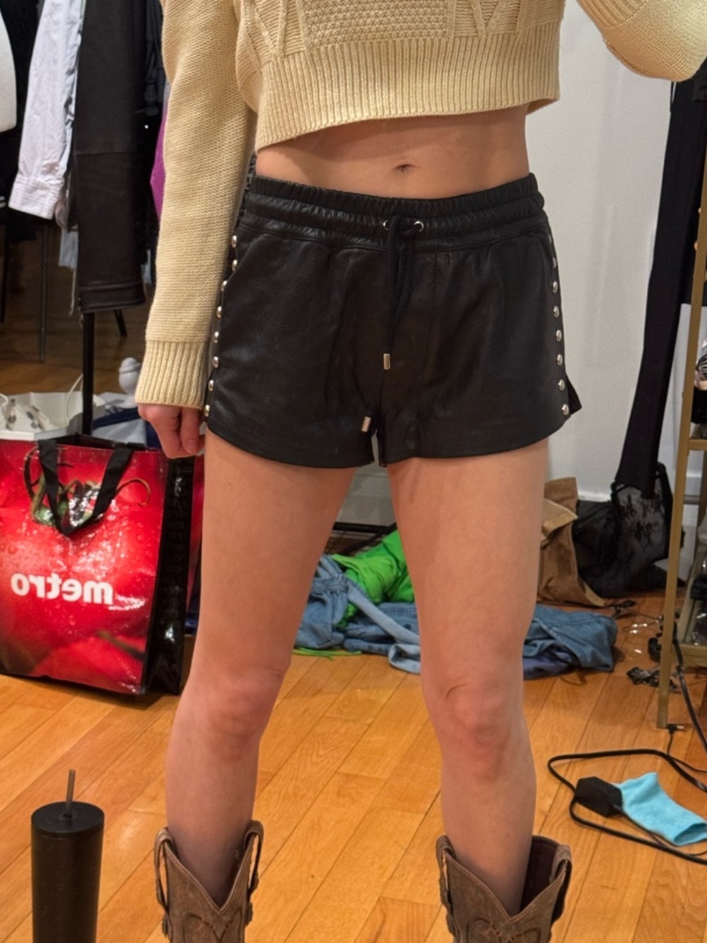 Moschino couture leather and silver grommet mini shorts